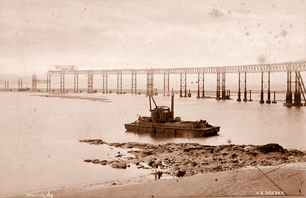 Barge in Foreground is the Sand Pump for Removing Sand Inside the Cassions