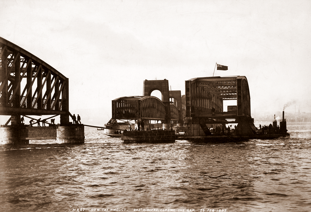 Floating the Central Girders into Position Before Raising